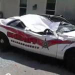 police car destroyed by criminal