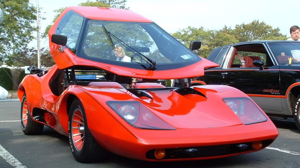 Red Car with Canopy Door