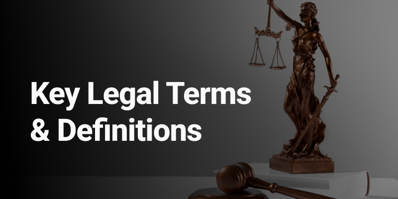 Minimalist legal-themed image featuring a judge's gavel and balanced scale on a sleek blue and gold gradient background. Text reads 'Key Legal Terms' in an elegant font