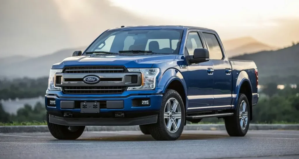 Business banner featuring two sides: one with a glossy silver car representing General Motors against a backdrop of upward financial trends, and the other showing a rugged blue Ford truck amidst a workshop setting with tools and car parts, highlighting ongoing quality checks.