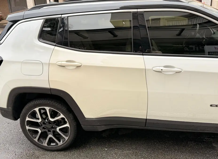  A White Jeep Compass with Mismatched Paint, an  example of repair related diminished value