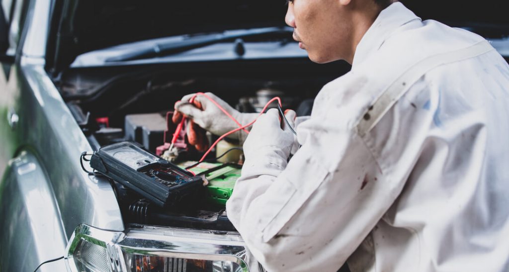 car-repairman-wearing-white-uniform-standing-holding-wrench-that-is-essential-tool-mechanic 2 1 1