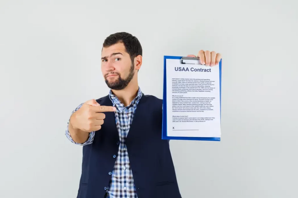young-USAA-Insuranser-1-star-man-showing-contract-1
